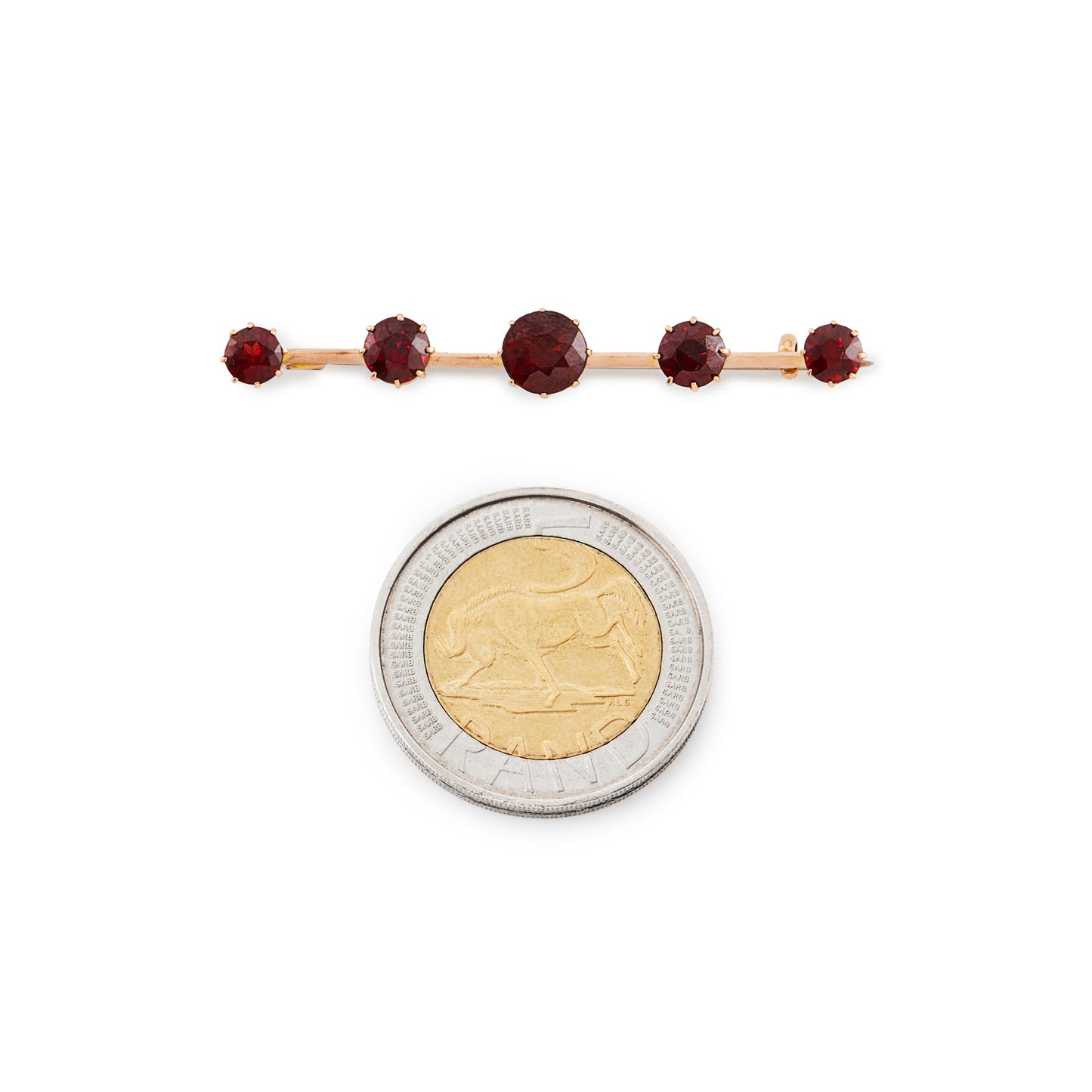 Classic 15ct rose gold Victorian bar brooch set with five beautifully faceted deep red garnets.