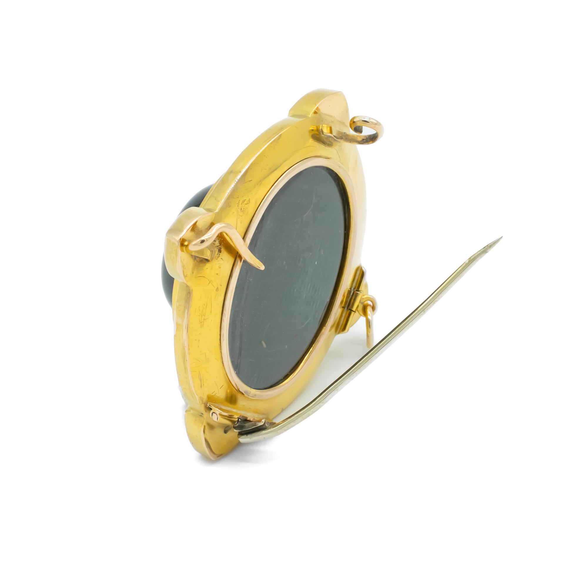 Stunning Victorian 15ct yellow gold pendant/brooch with large oval cabochon garnet, beautiful blue and white enamelling and fine leaf engravings.