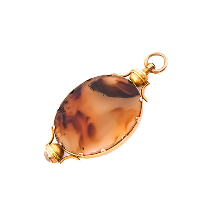 Classic 15ct yellow gold Victorian pendant set with a large oval brown moss agate disk.