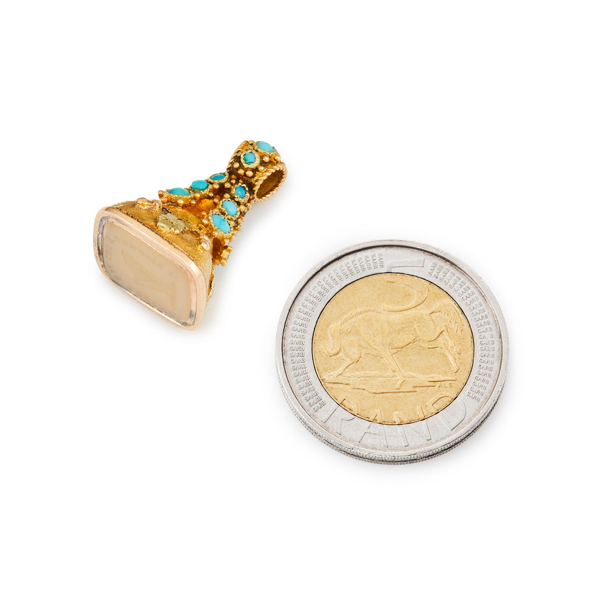Very ornate small Victorian 15ct gold small fob seal set with sixteen turquoise cabochon stones and a chalcedony intaglio.