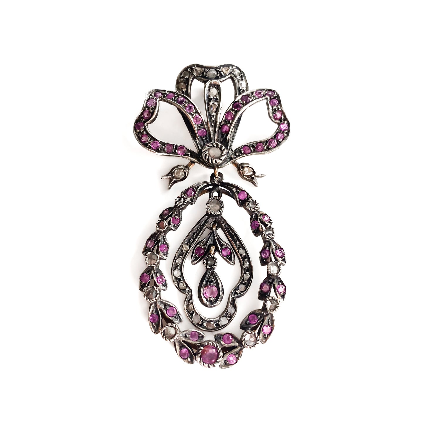 Magnificent Victorian 15ct gold and silver pendant set with fifty-two faceted rubies and thirty-seven mine cut diamonds.