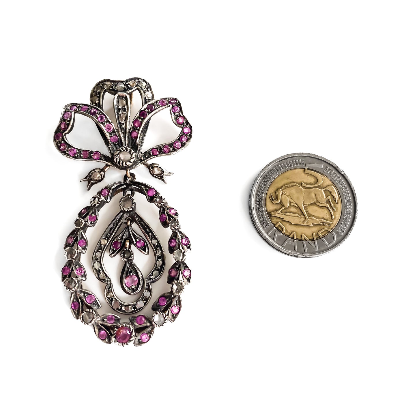 Magnificent Victorian 15ct gold and silver pendant set with fifty-two faceted rubies and thirty-seven mine cut diamonds.