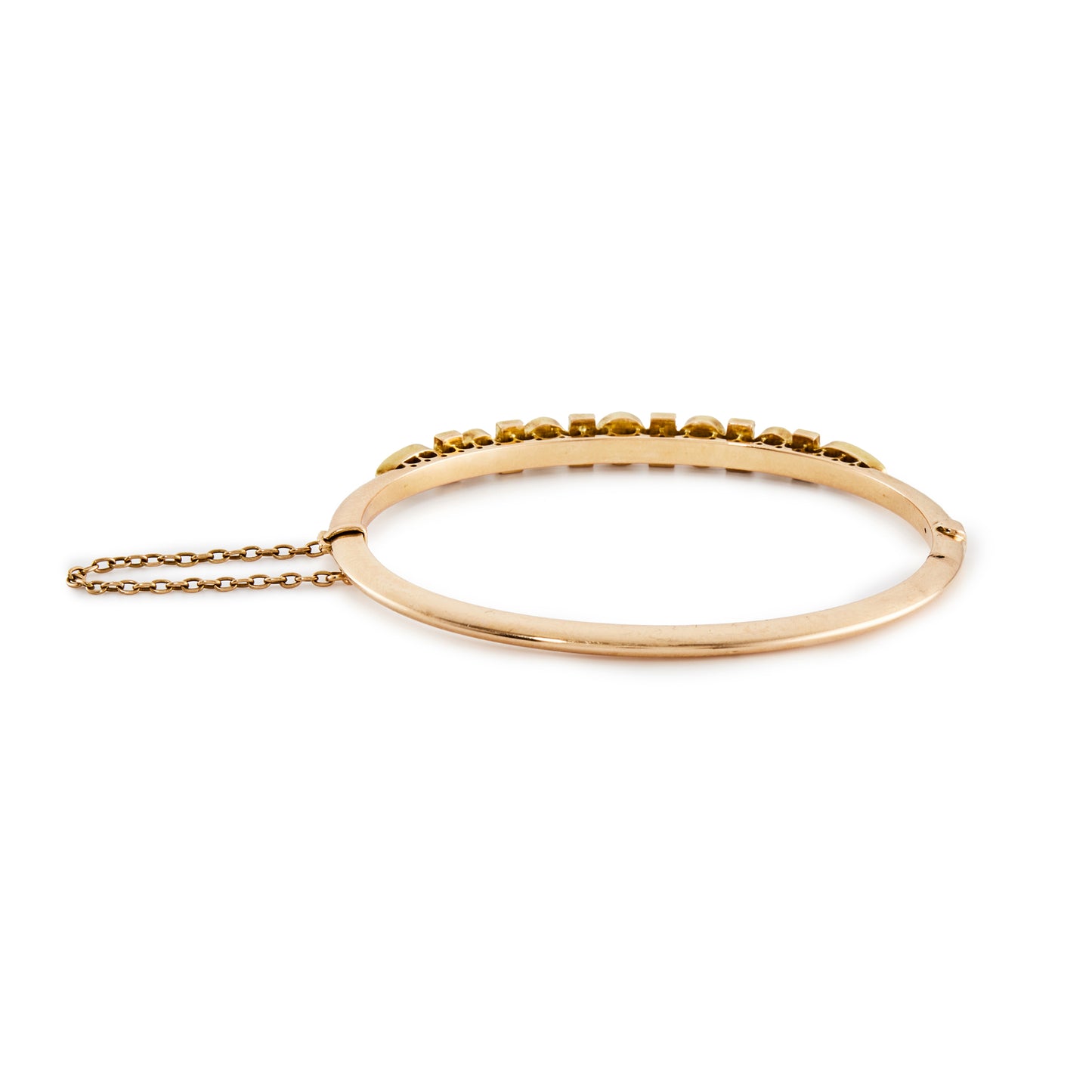 Stunning Victorian 15ct rose gold bangle, set with seven turquoise stones and twelve seed pearls. With a safety chain.