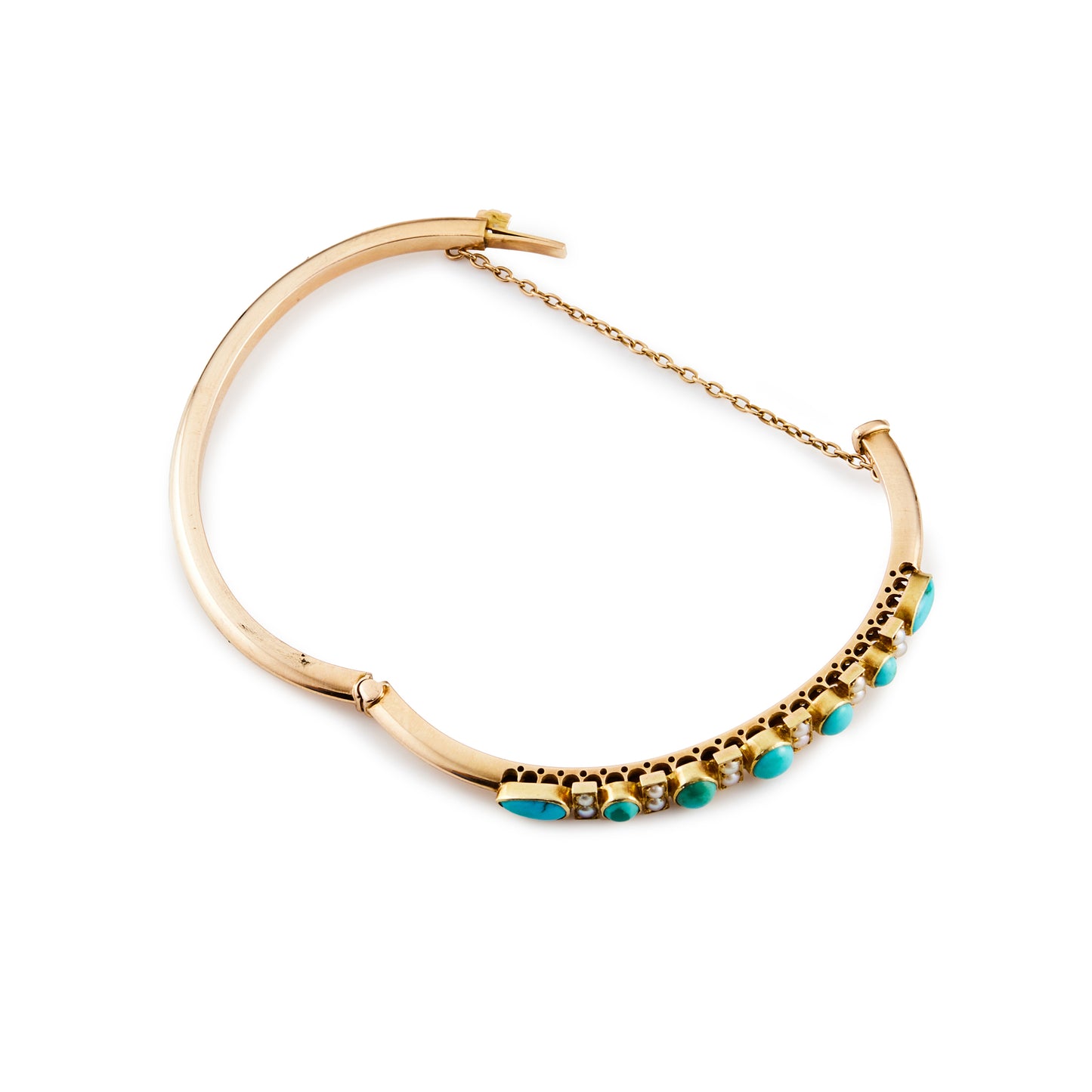 Stunning Victorian 15ct rose gold bangle, set with seven turquoise stones and twelve seed pearls. With a safety chain.