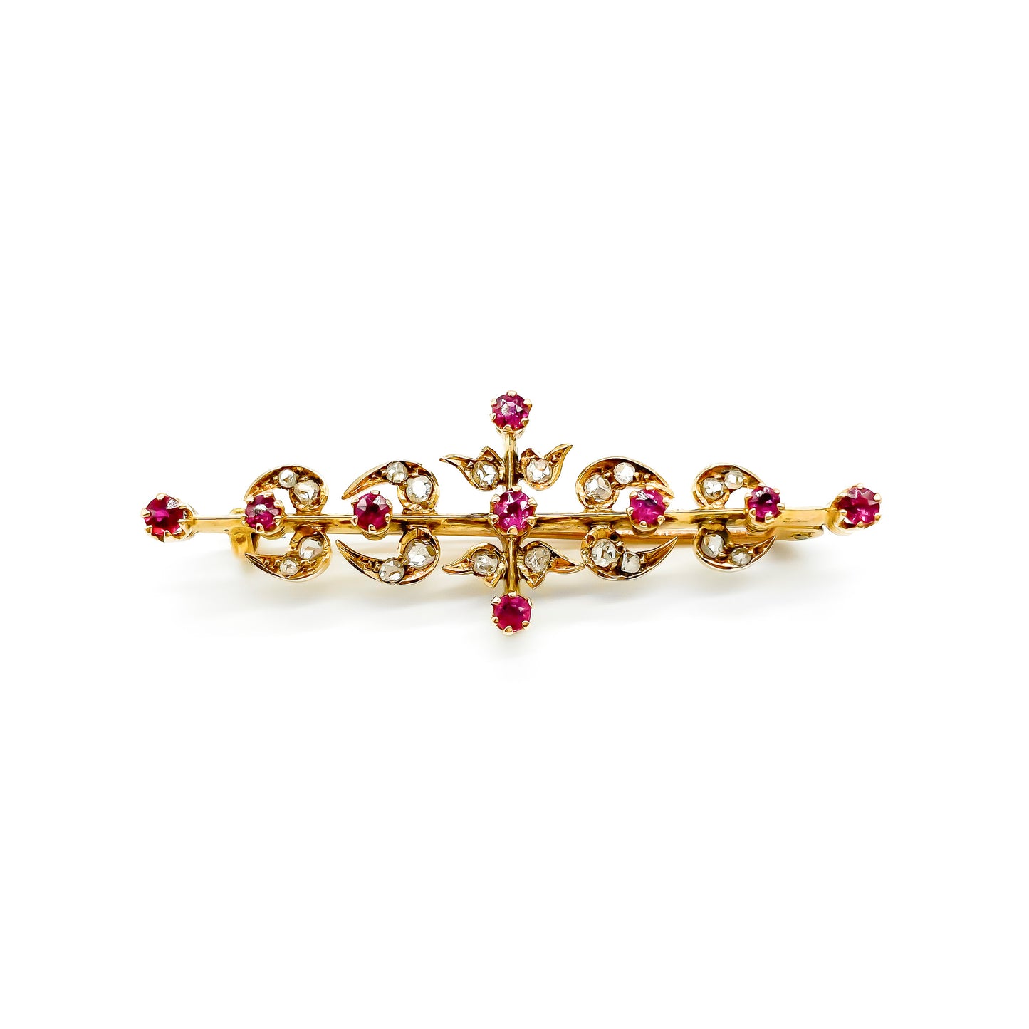 Dainty Victorian 18ct gold bar brooch set with nine rubies and twenty mine cut diamonds.