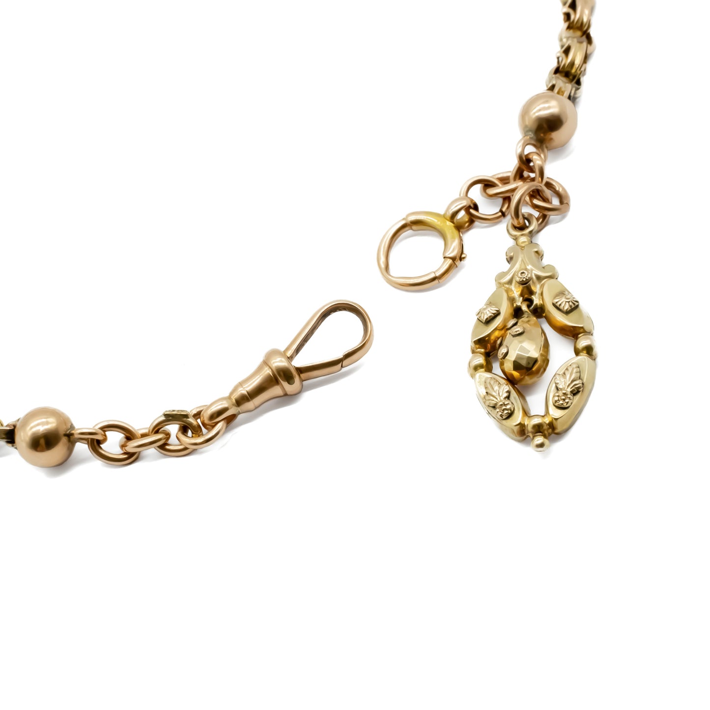 Very ornate Victorian fancy link 9ct rose/yellow gold chain with a beautiful repoussé dangling drop.