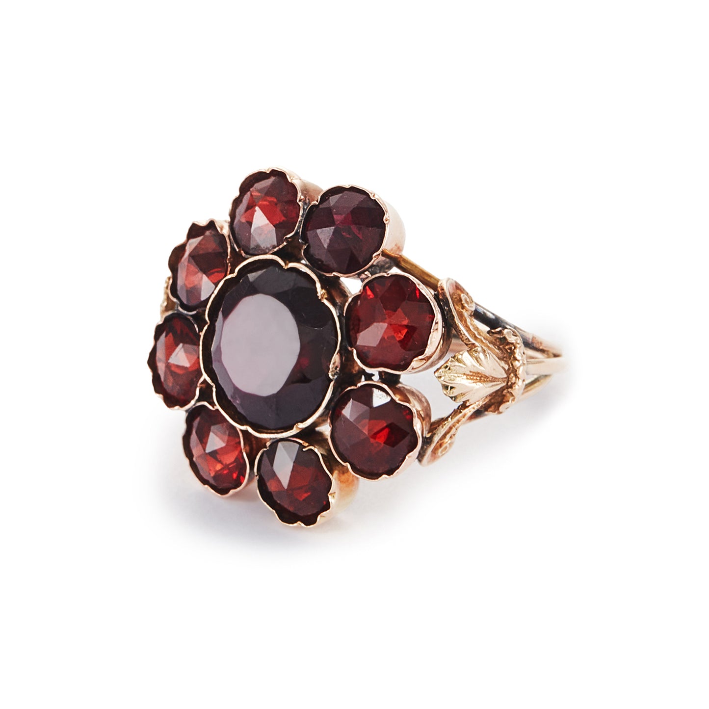 Spectacular Victorian 9ct gold cocktail ring with nine deep red Bohemian garnets in a cluster setting. The ring has lovely scrollwork detail on the shoulders.
