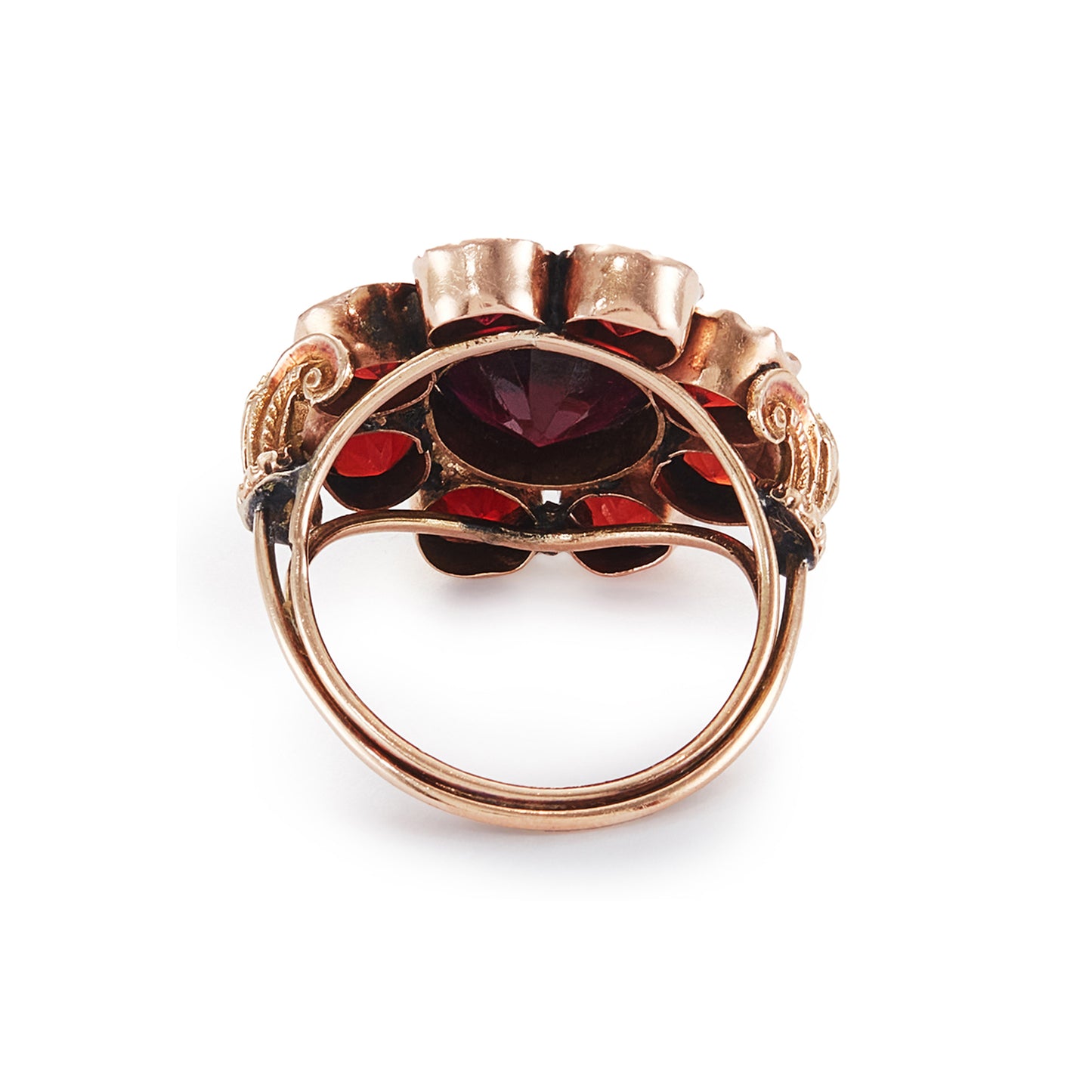Spectacular Victorian 9ct gold cocktail ring with nine deep red Bohemian garnets in a cluster setting. The ring has lovely scrollwork detail on the shoulders.