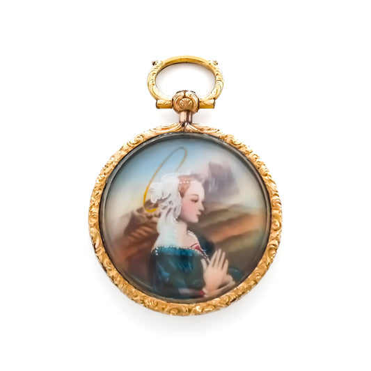 Pretty Victorian hand painted miniature under glass in a beautifully engraved 9ct gold setting.