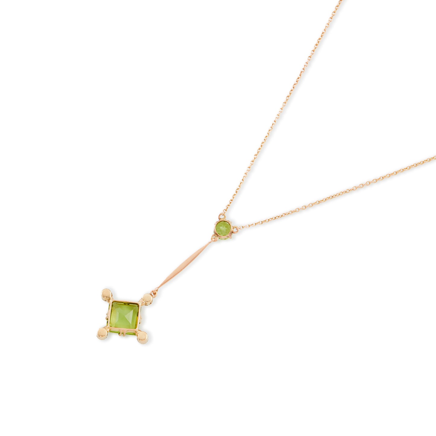 Delicate Victorian 9ct gold dangling pendant, set with two peridots and four seed pearls. Barrel clasp.