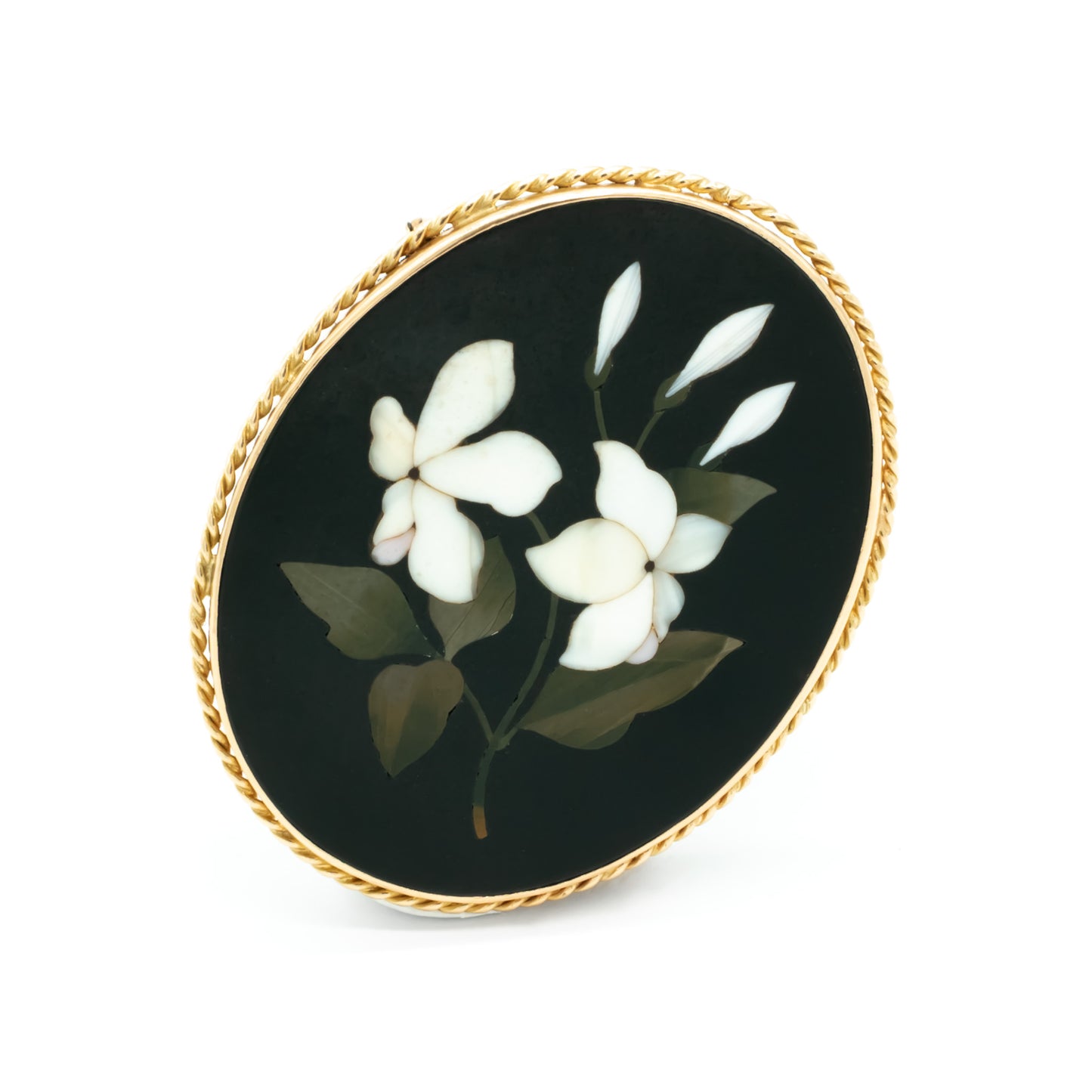 Sought-After Victorian 9ct gold natural stone Pietra Dura brooch depicting white flowers and dark green leaves.