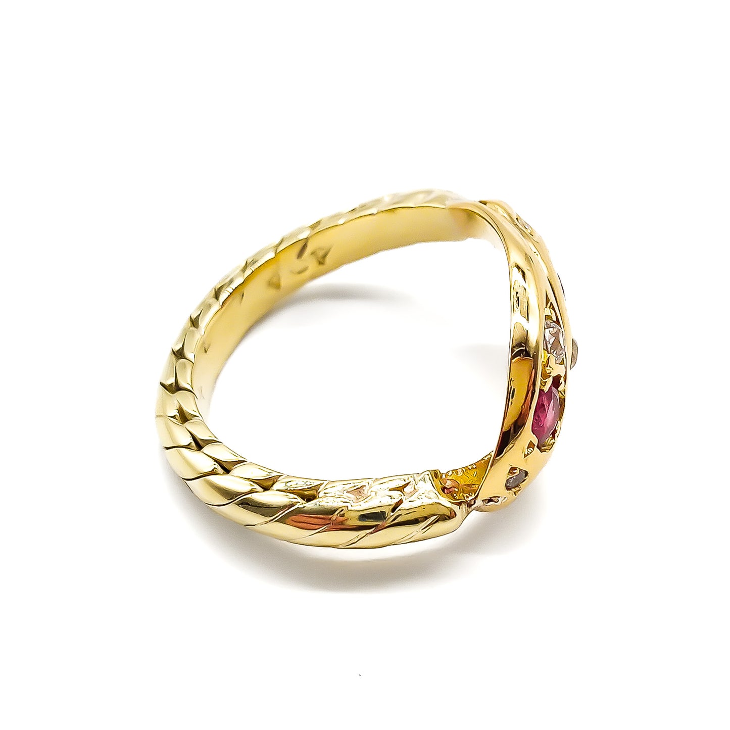 Stunning Victorian 9ct gold snake ring set with two rubies and six old-cut diamonds.