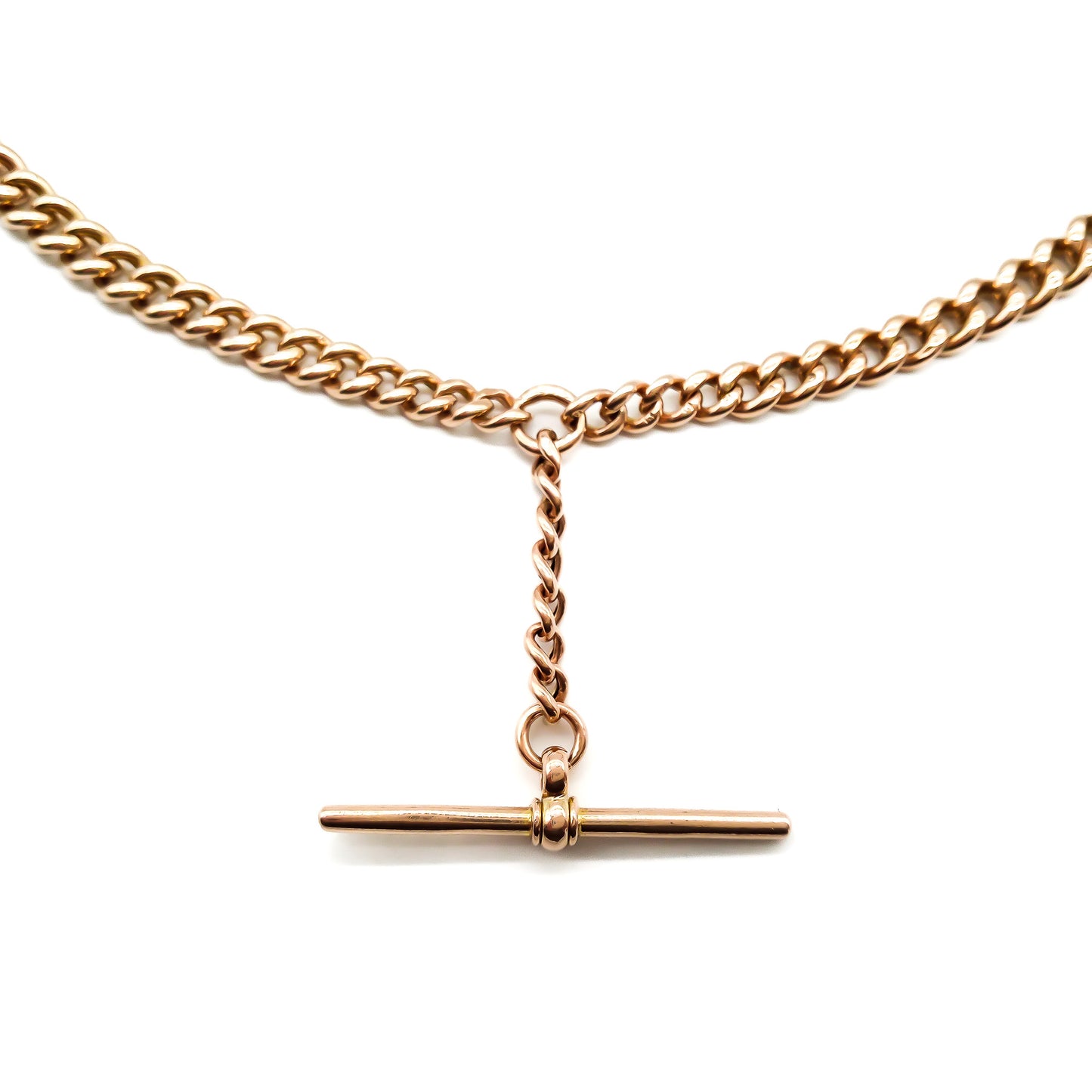 Classic Victorian 9ct rose gold graduated curb link fob chain with a dog-clip and T-bar.