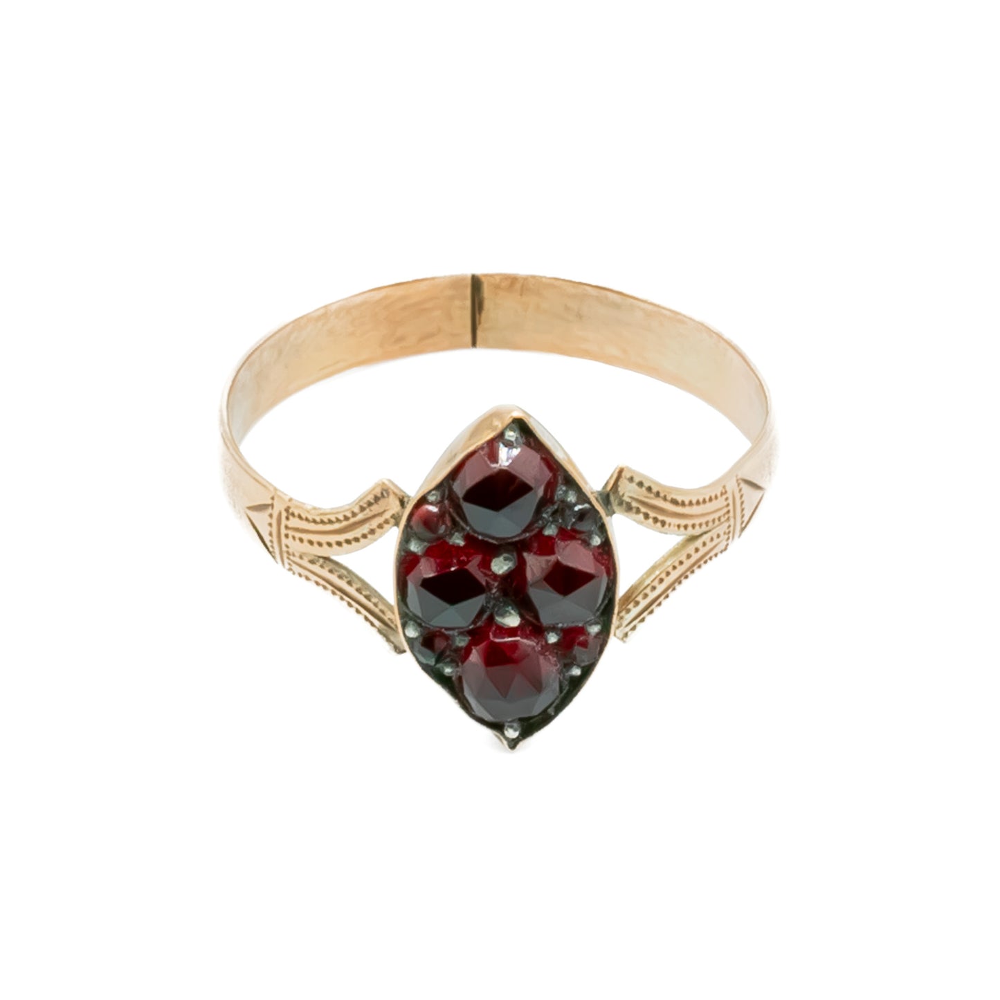 Dainty Victorian 9ct rose gold ring set with eight deep red faceted garnets.