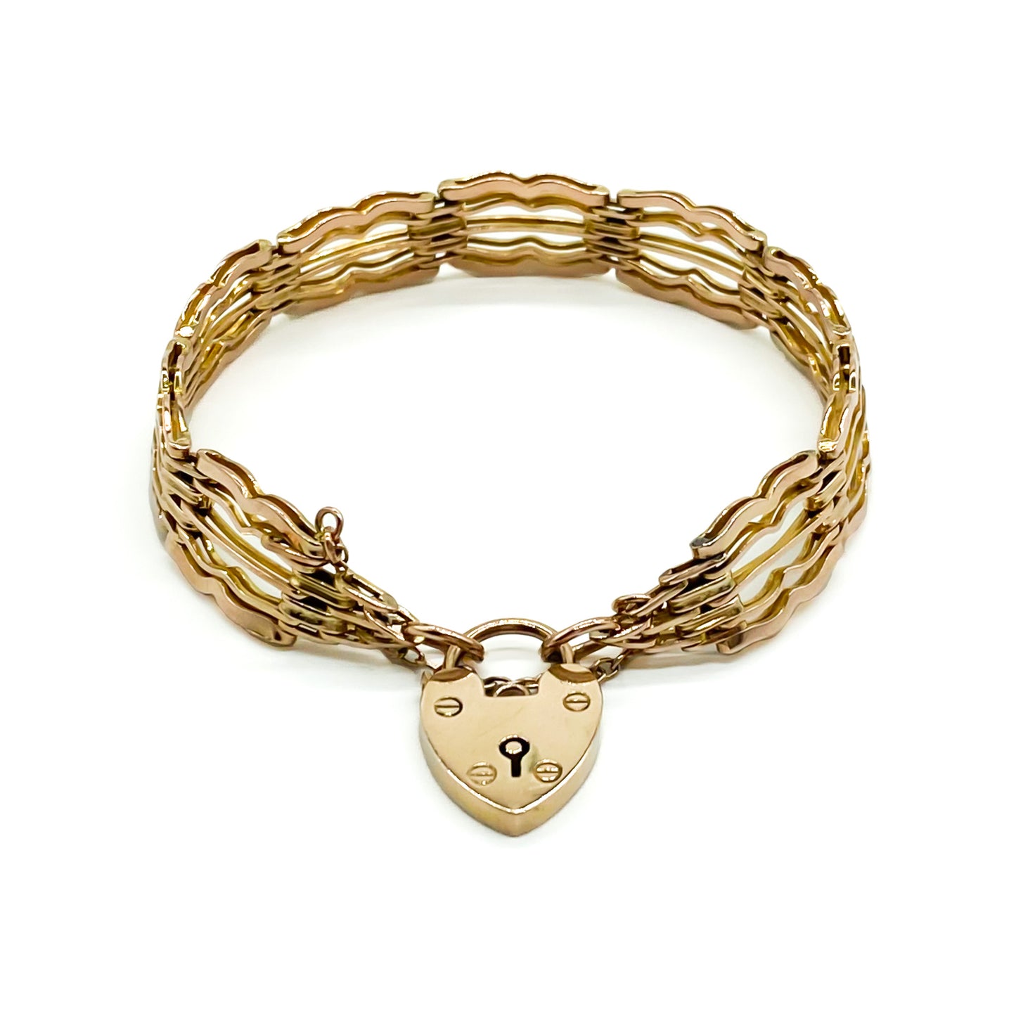 Stylish Victorian 9ct rose gold gateleg bracelet with a padlock and safety chain.