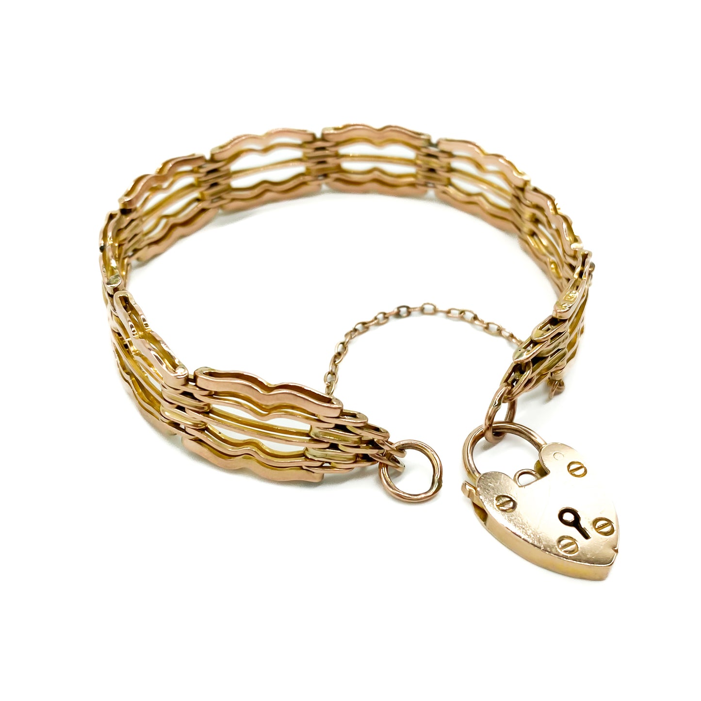 Stylish Victorian 9ct rose gold gateleg bracelet with a padlock and safety chain.