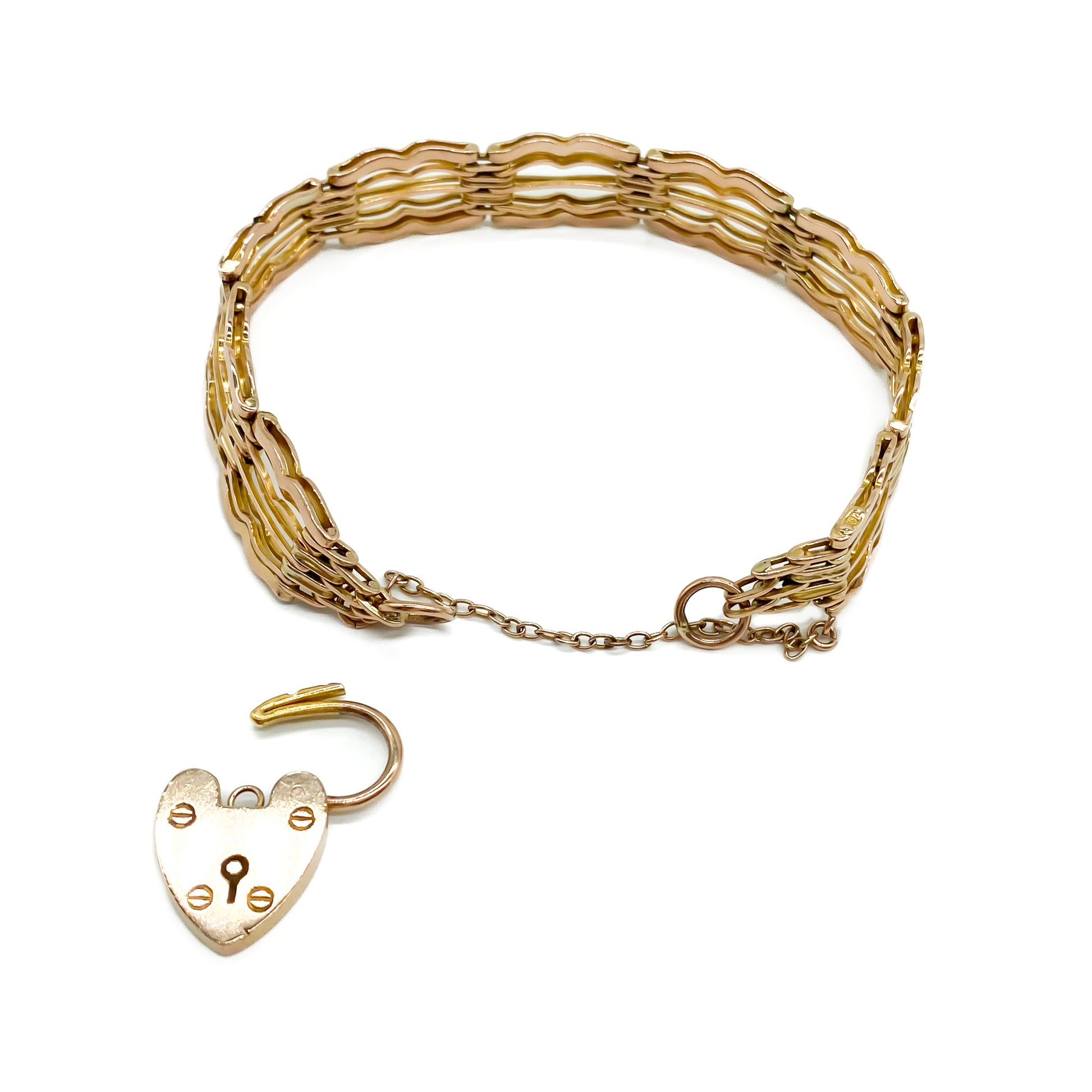 Stylish Victorian 9ct rose gold gateleg bracelet with a padlock and safety chain.