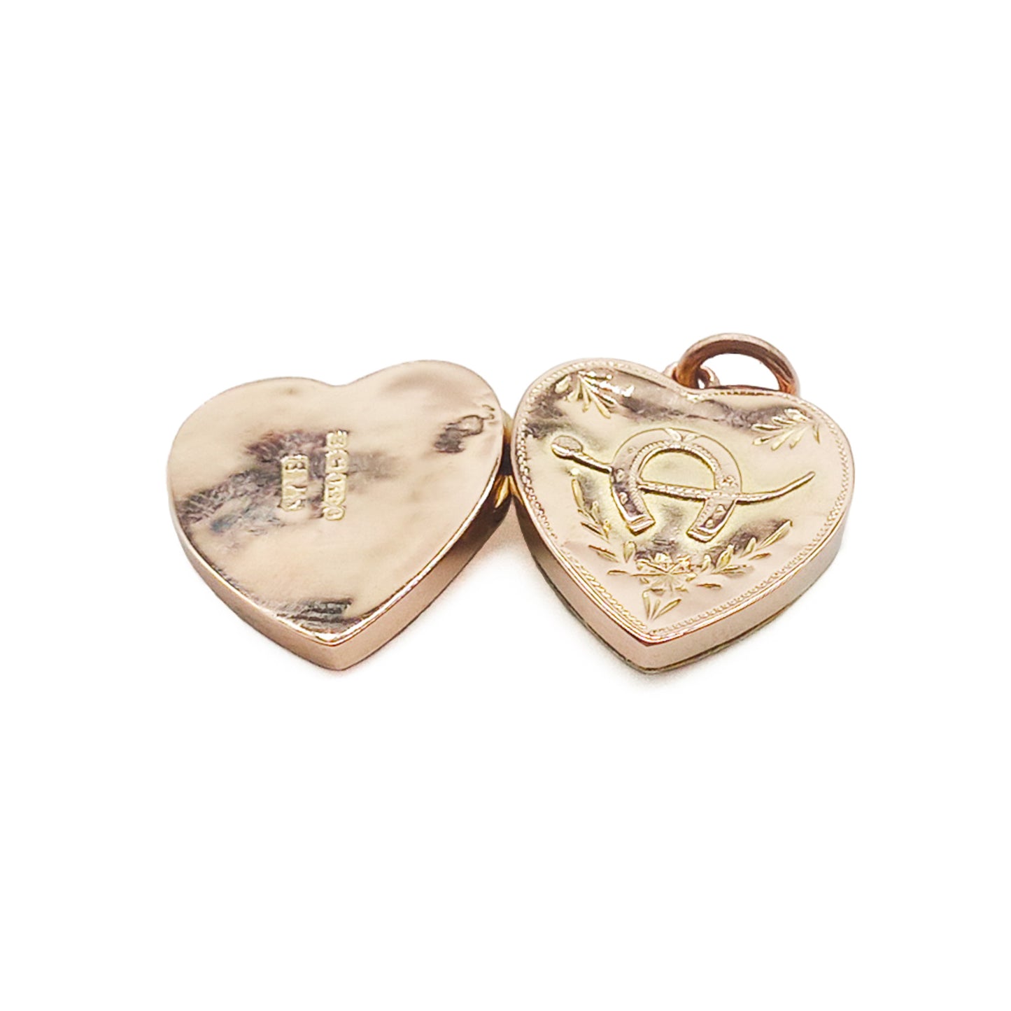 Lovely Victorian 9ct rose gold heart locket with a horseshoe design on the front.