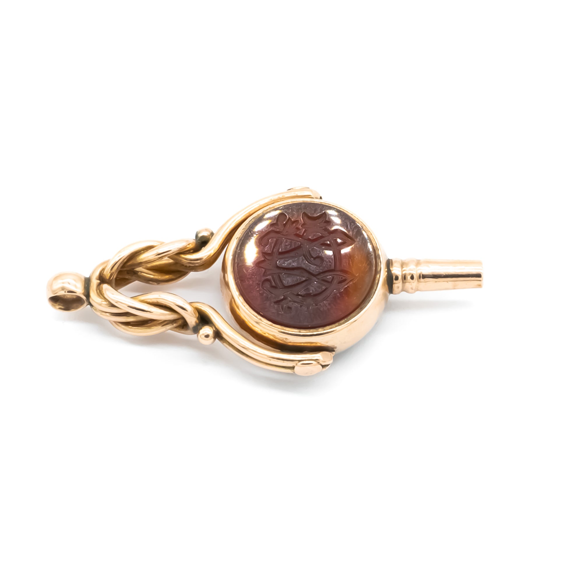 Classic Victorian 9ct rose gold swivel seal/watch key set with a carnelian intaglio and sardonyx.