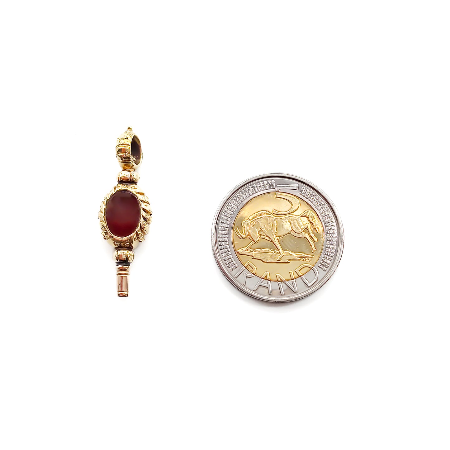 Beautifully engraved small 9ct gold Victorian watch key set with a bloodstone on one side and carnelian on the other.