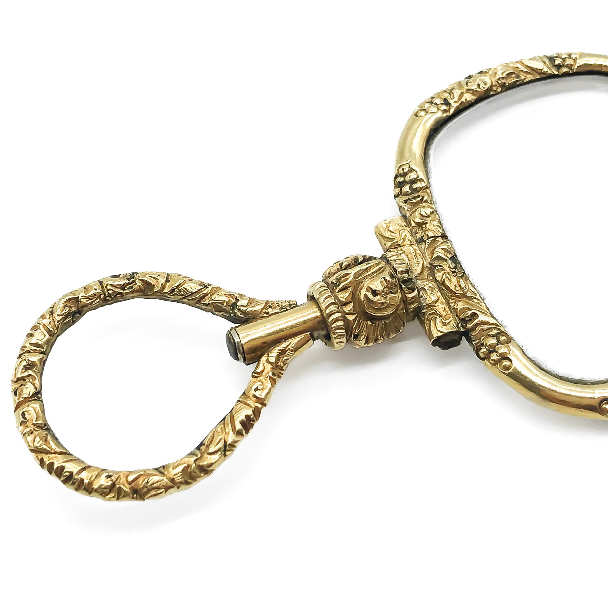 Ornate gold cased Victorian lorgnette with beautiful floral engraving.