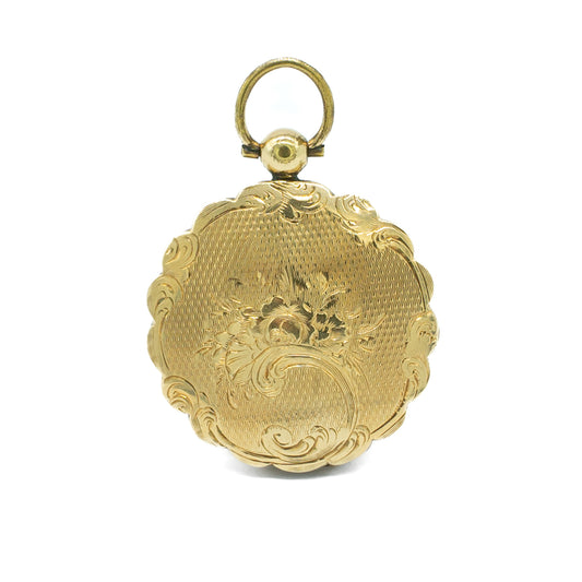 Pretty Victorian gold cased pendant with beautiful engraving.