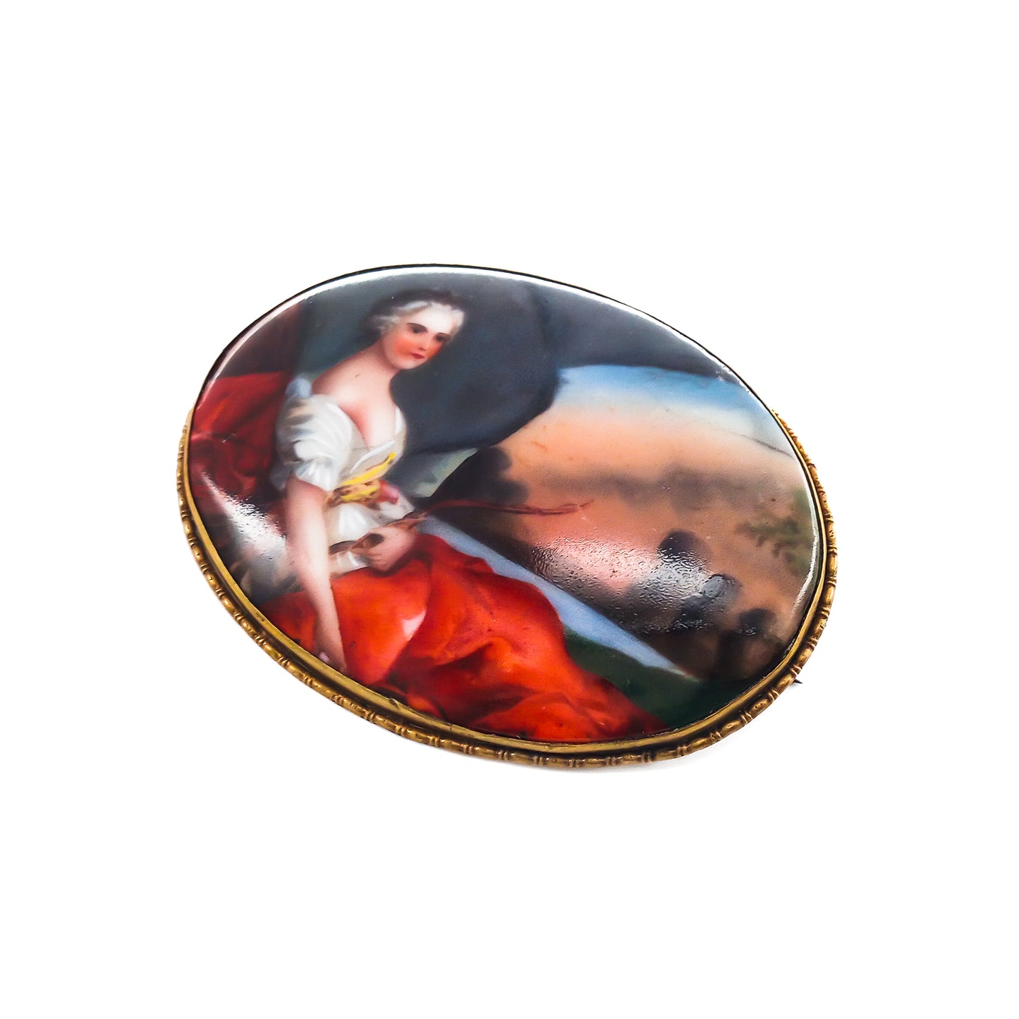 Unusually large Victorian hand painted portrait brooch depicting a lovely lady in a pastoral scene, with a brass frame.