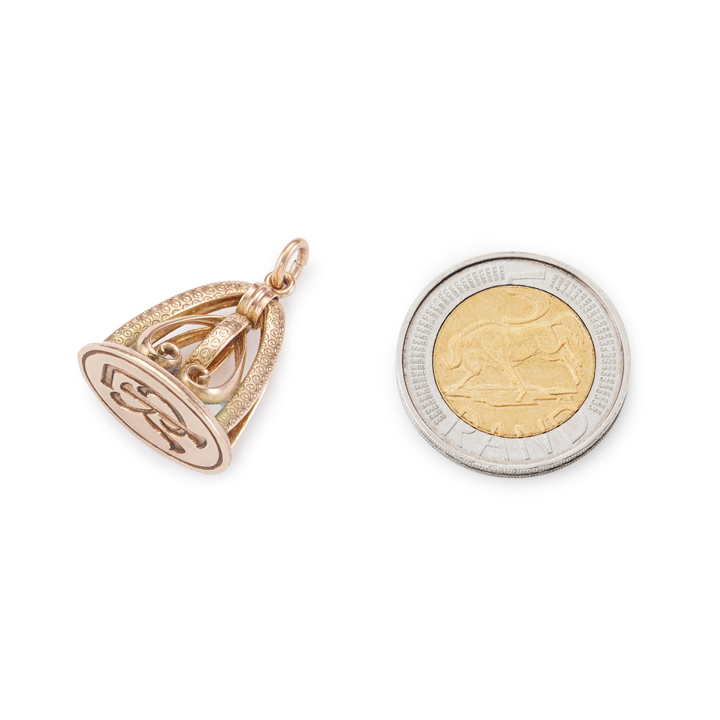 Charming Victorian rose gold-cased fob seal with fancy script initials and ornate detail.