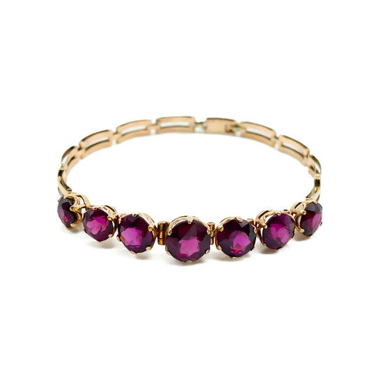 Gorgeous Victorian rose gold bracelet set with seven beautifully faceted rhodolite garnets.