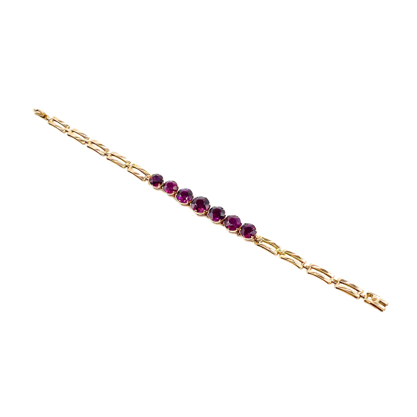 Gorgeous Victorian rose gold bracelet set with seven beautifully faceted rhodolite garnets.