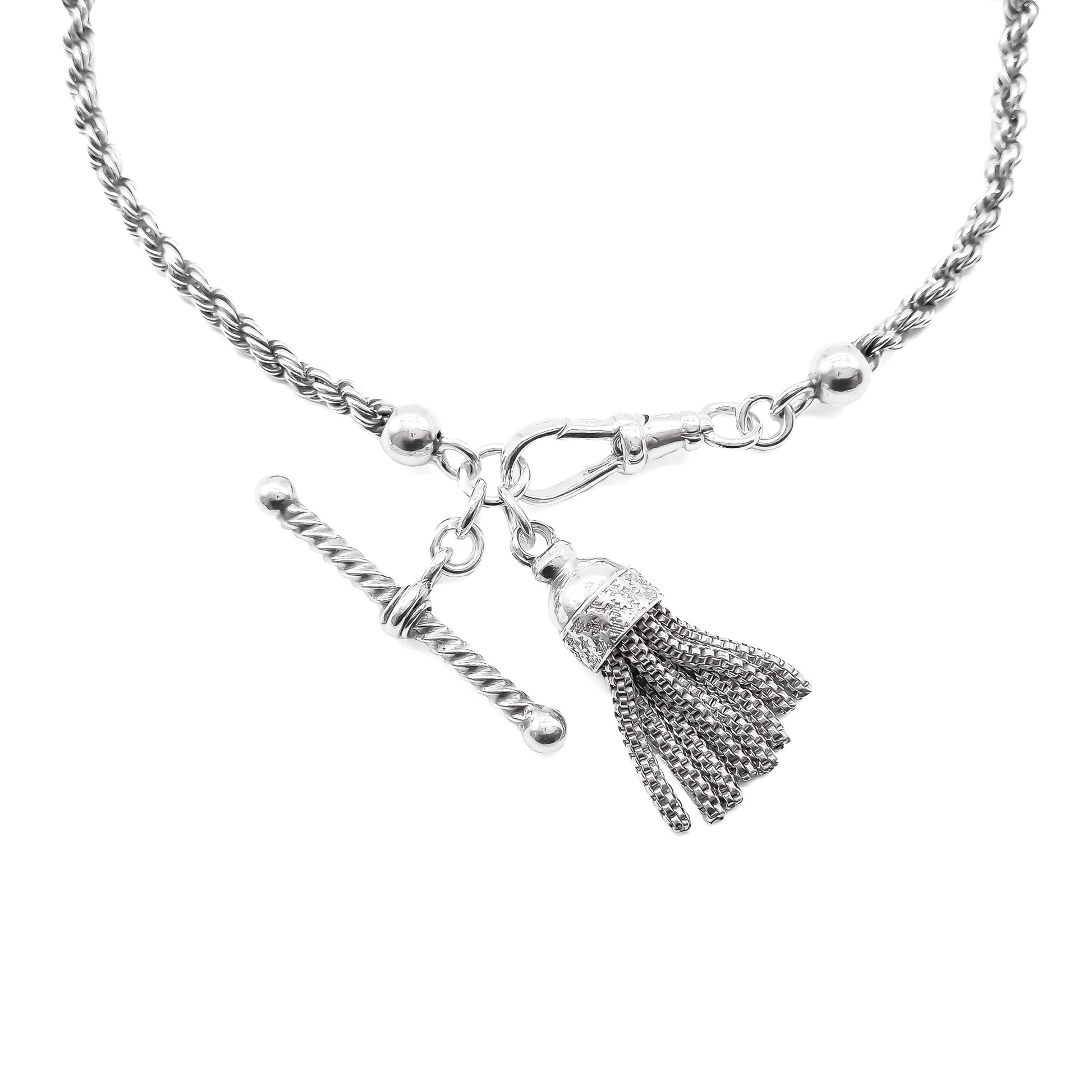 Lovely Victorian silver albertina with ornate detail, a dog clip, tassel and t-bar. Ideal to be attached to another albertina to make a neck chain.