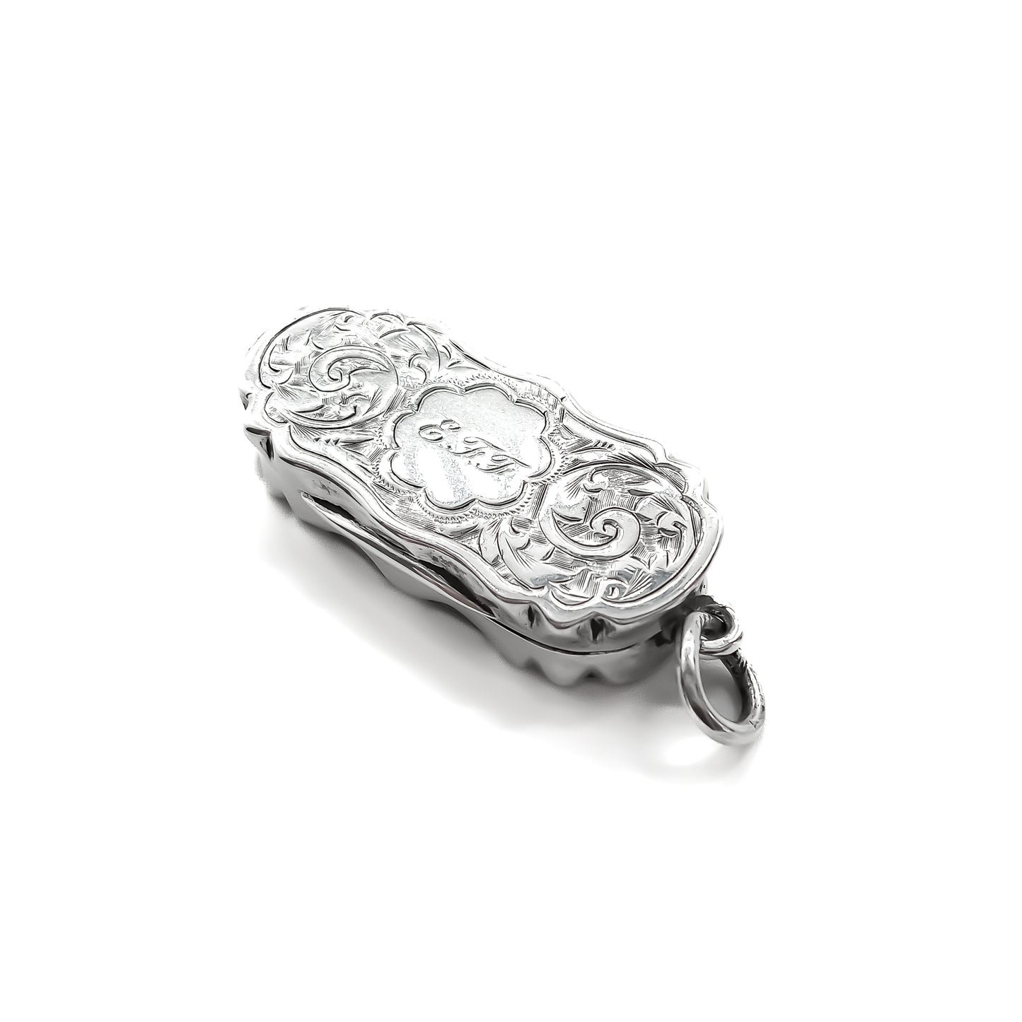 Beautifully engraved Victorian silver vinaigrette that can be worn as a pendant. Chester 1901