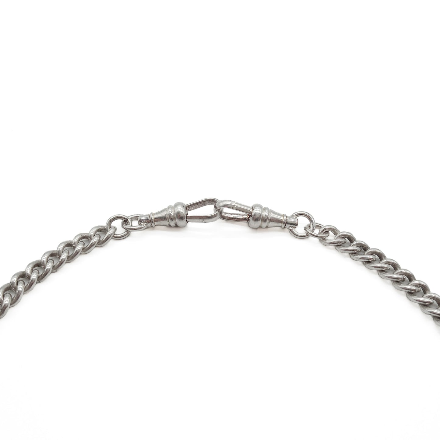 Classic Victorian sterling silver curb link fob chain with two dog clips and a t-bar. Every link is stamped.