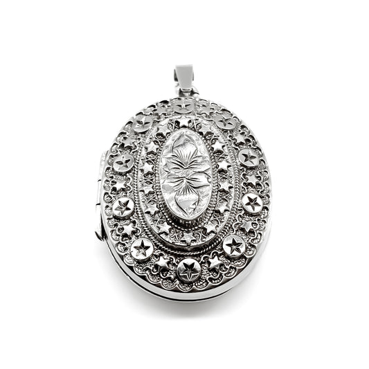 Very pretty ornate Victorian oval sterling silver locket.