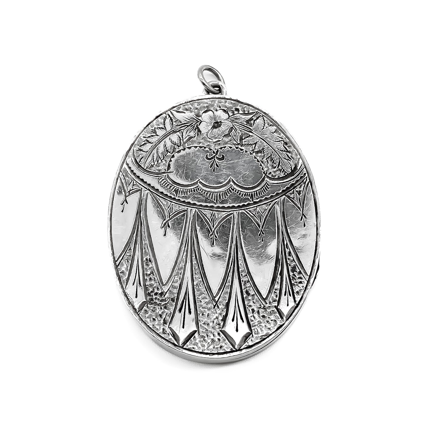 Beautifully engraved Victorian sterling silver oval locket. Maker: GL and CO.