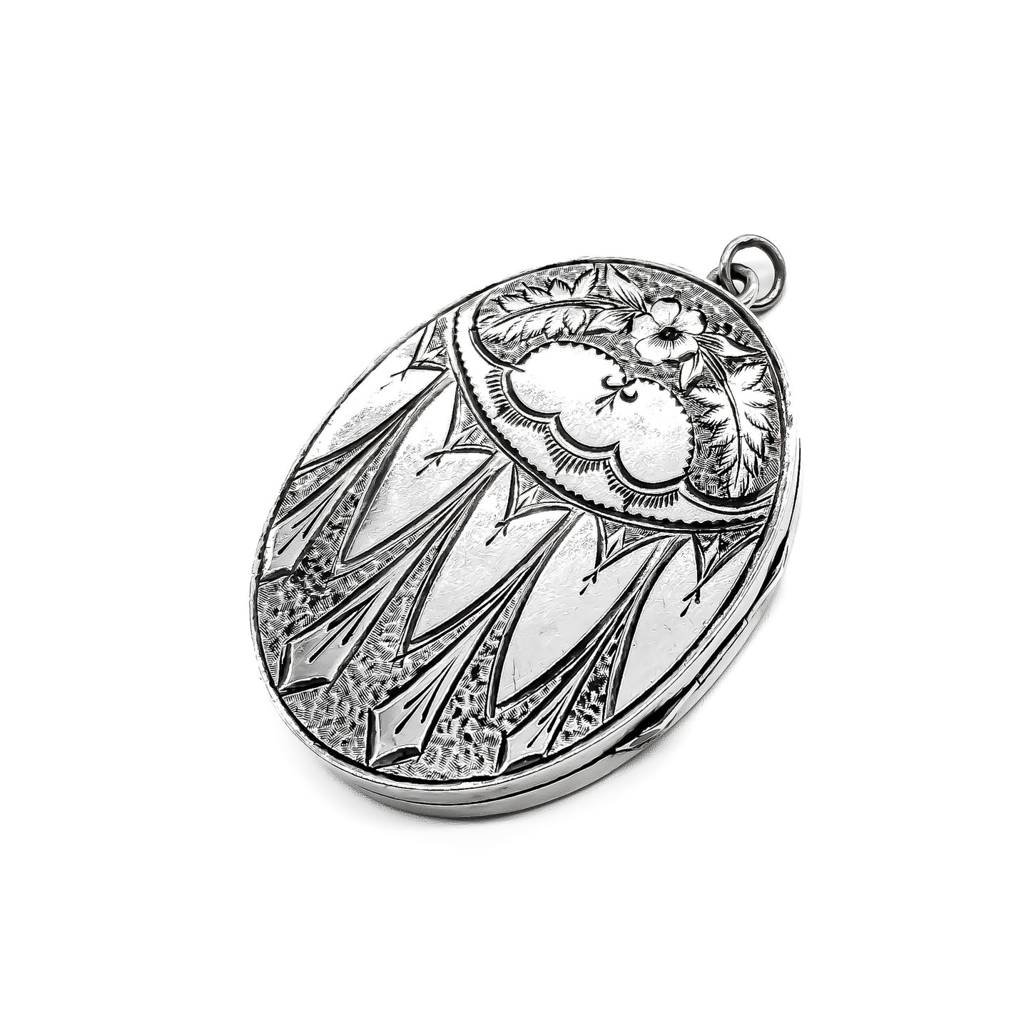 Beautifully engraved Victorian sterling silver oval locket. Maker: GL and CO.