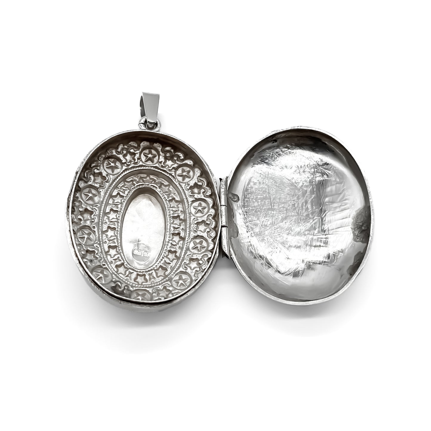 Very pretty ornate Victorian oval sterling silver locket.