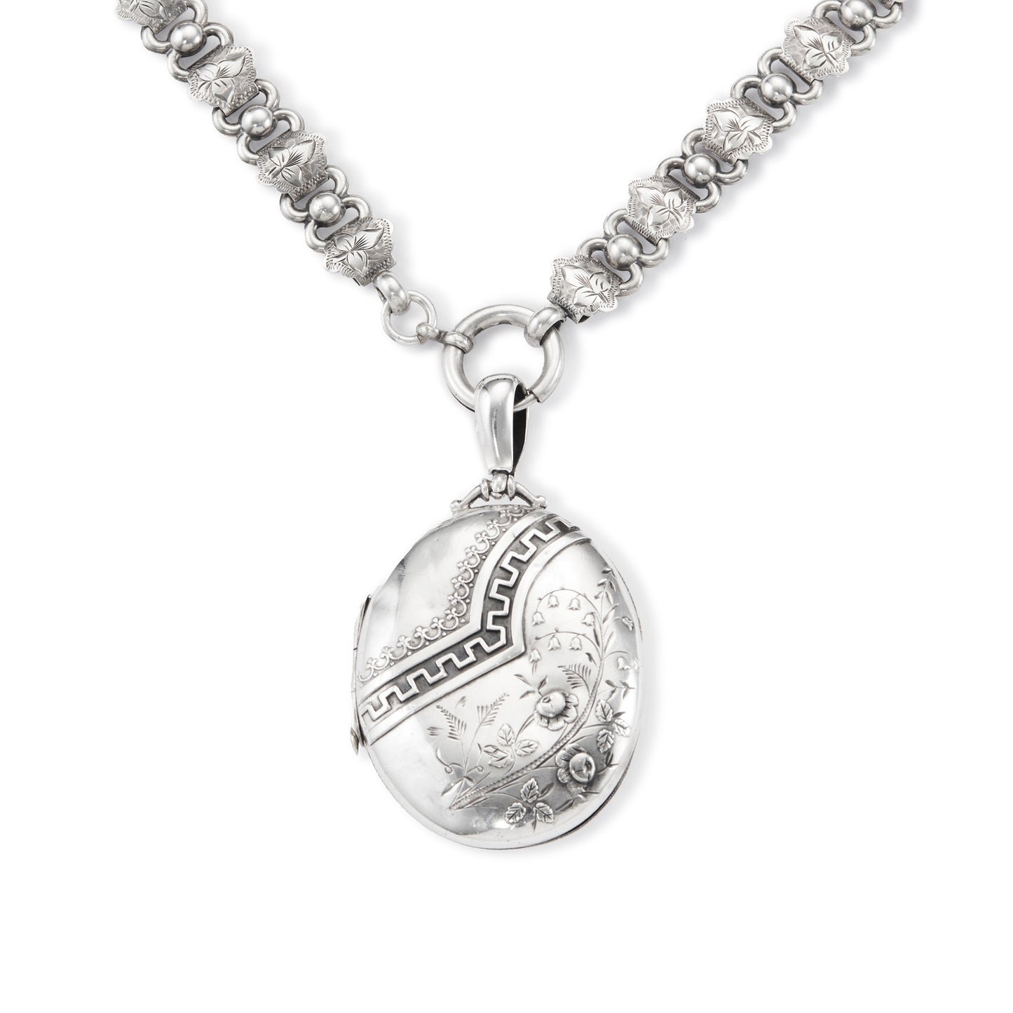 Beautiful Victorian sterling silver locket with intricate detail on an ornate sterling silver chain. Faint inscription at the back of the locket.