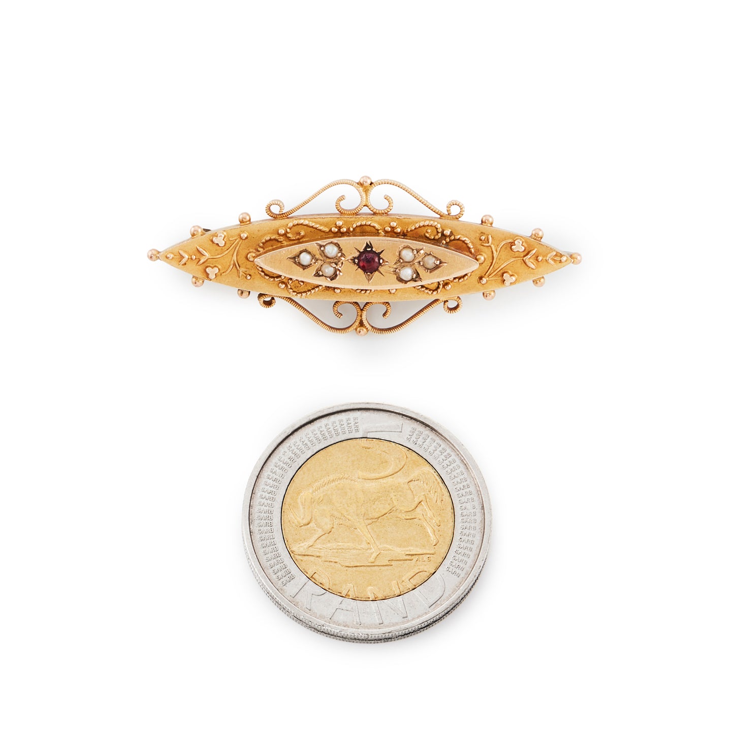 Dainty Etruscan-style 9ct gold Victorian memorial bar brooch with a garnet and seed pearls, in an intricate setting.