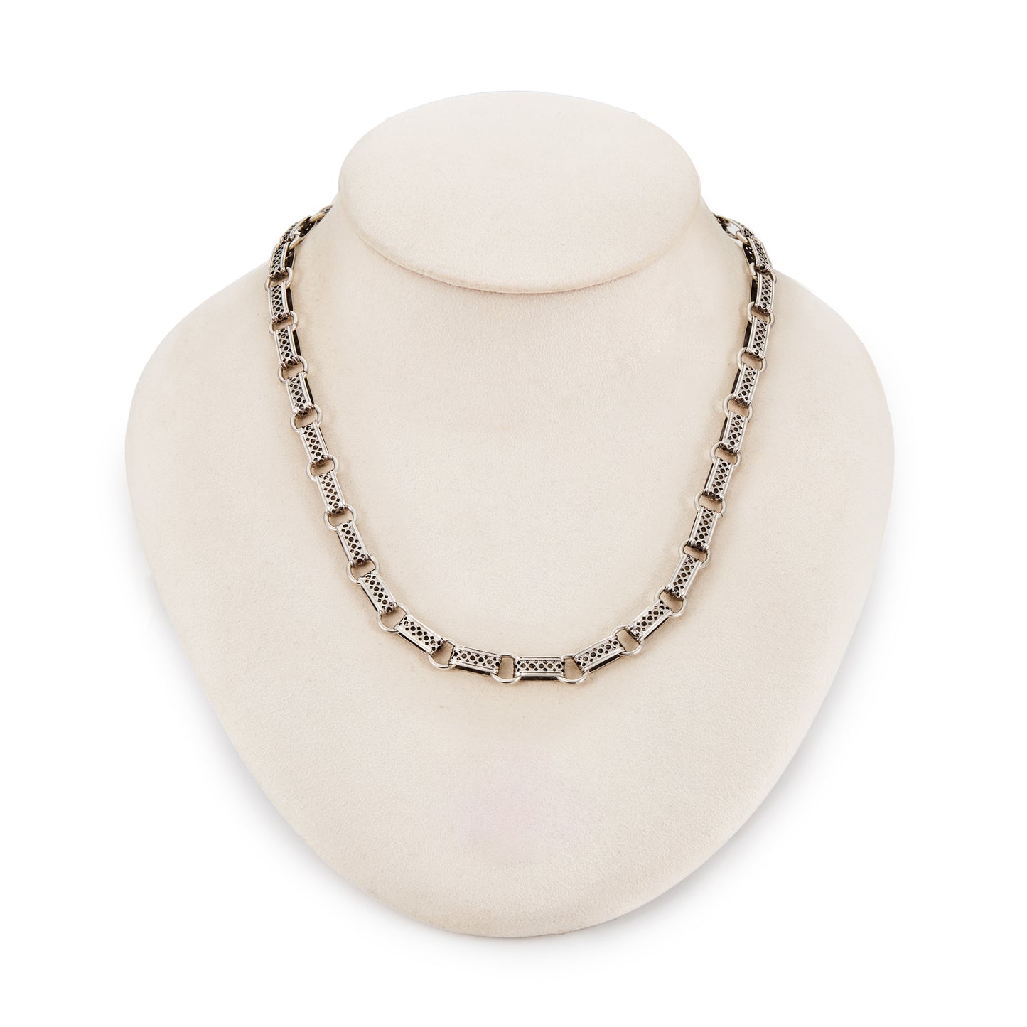 Classic Victorian silver book chain necklace with filigree links and a large bolt ring clasp.