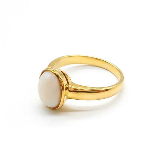 Classic 18ct yellow gold ring with a tube set luminescent oval opal.