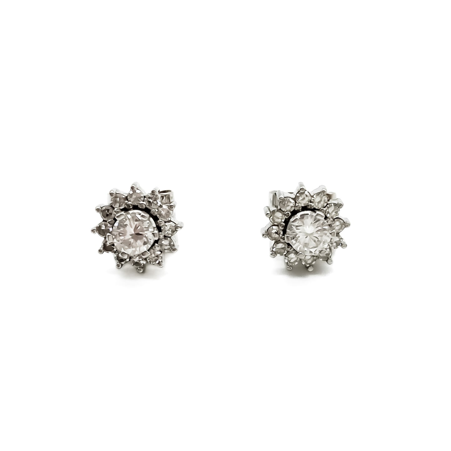 Stylish vintage 18ct white gold flower stud earrings with diamonds in a tier setting.