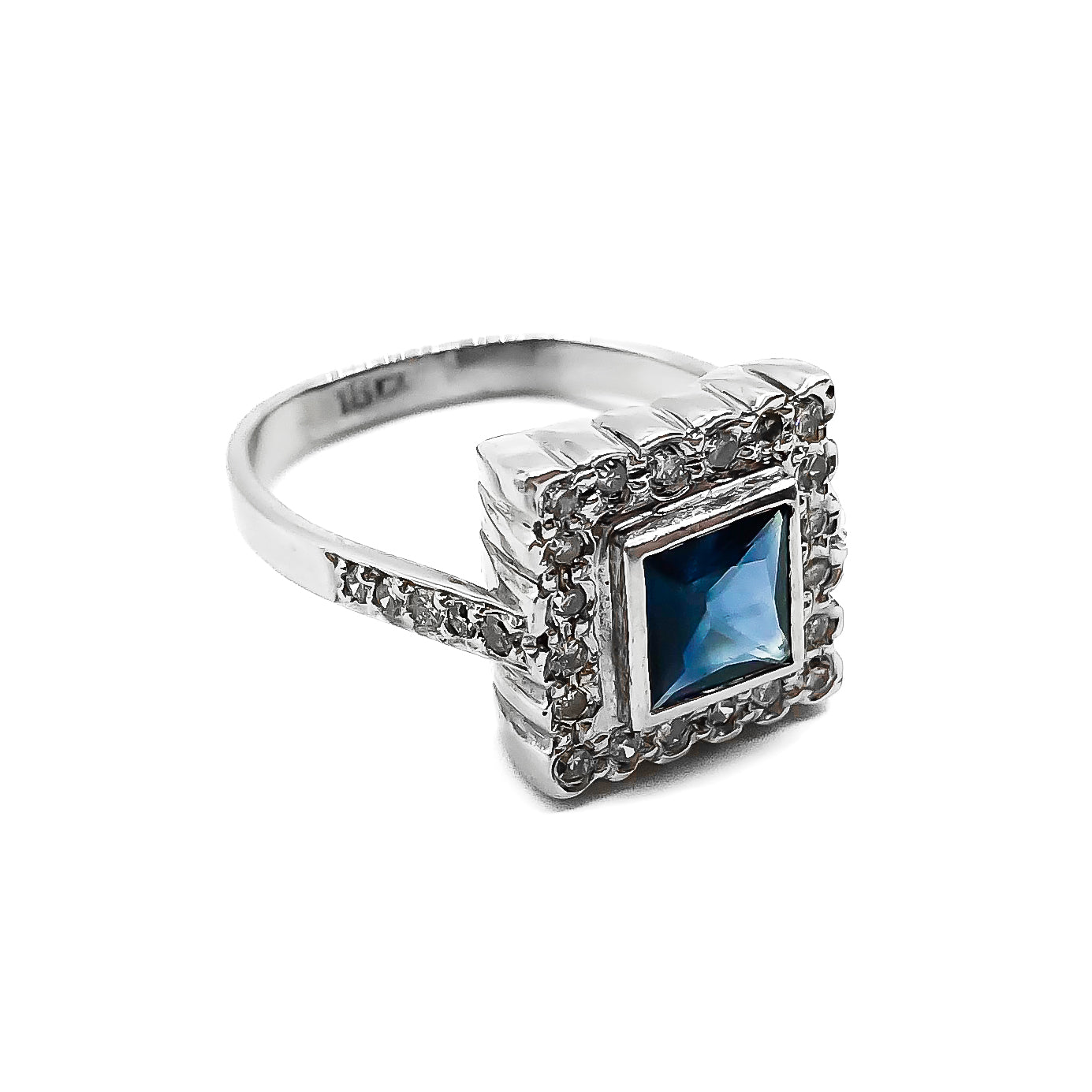 Stunning Art Deco style 18ct white gold ring with a square sapphire surrounded by twenty diamonds and ten smaller diamonds on the shank.