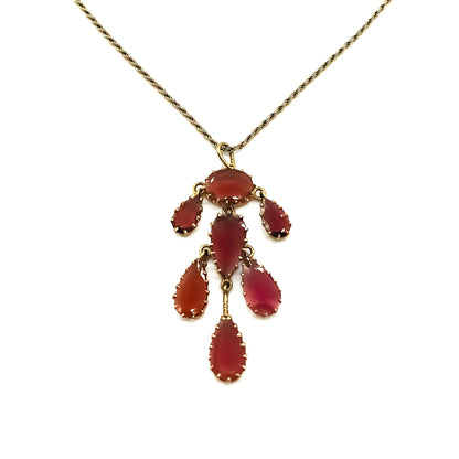 Gorgeous vintage 9ct gold pendant set with dangling teardrop garnets, on a 9ct gold chain.