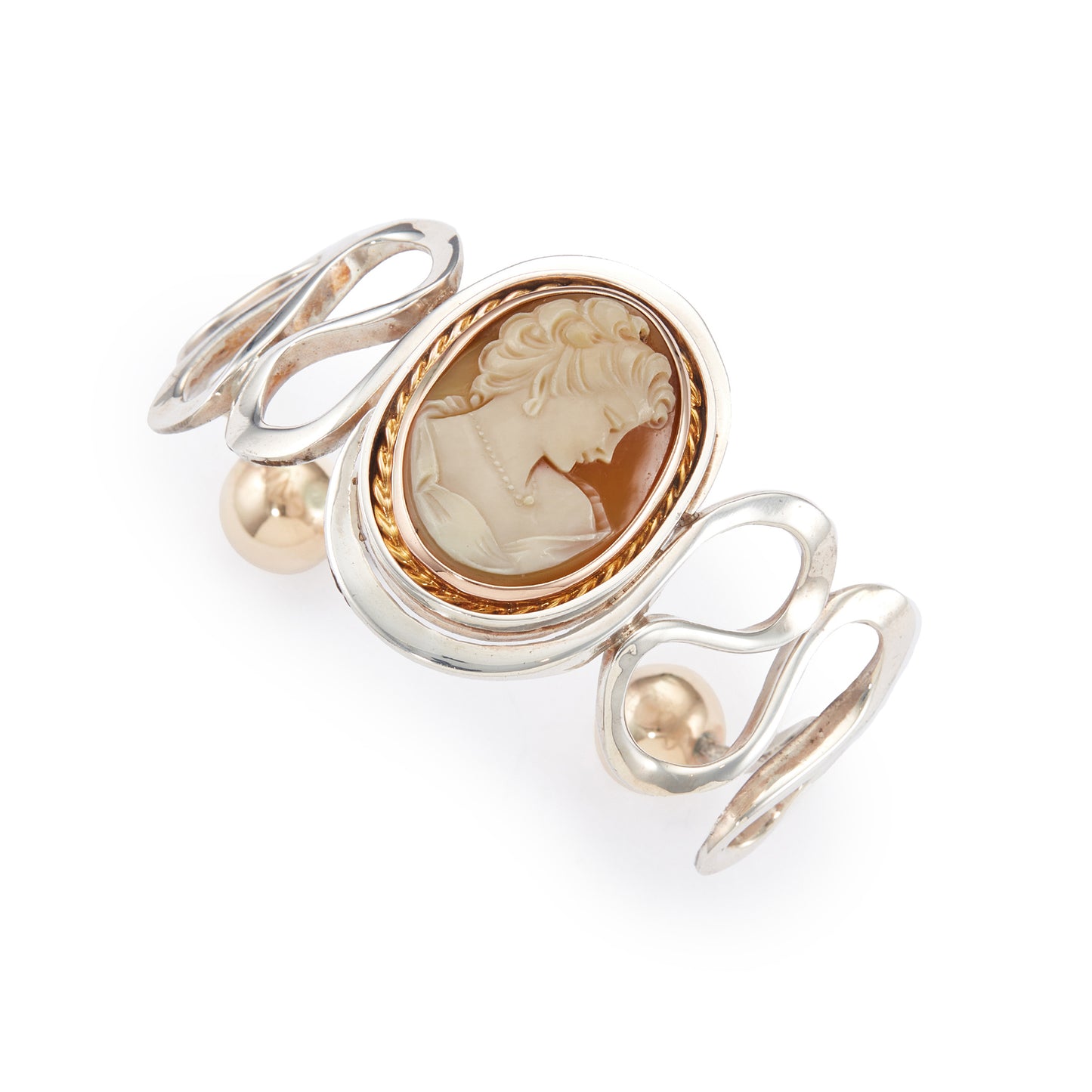 Beautifully handcrafted vintage designer sterling silver bangle with a classic cameo in a 9ct rose gold frame and 9ct rose gold beads at the opening. Will fit most wrists.