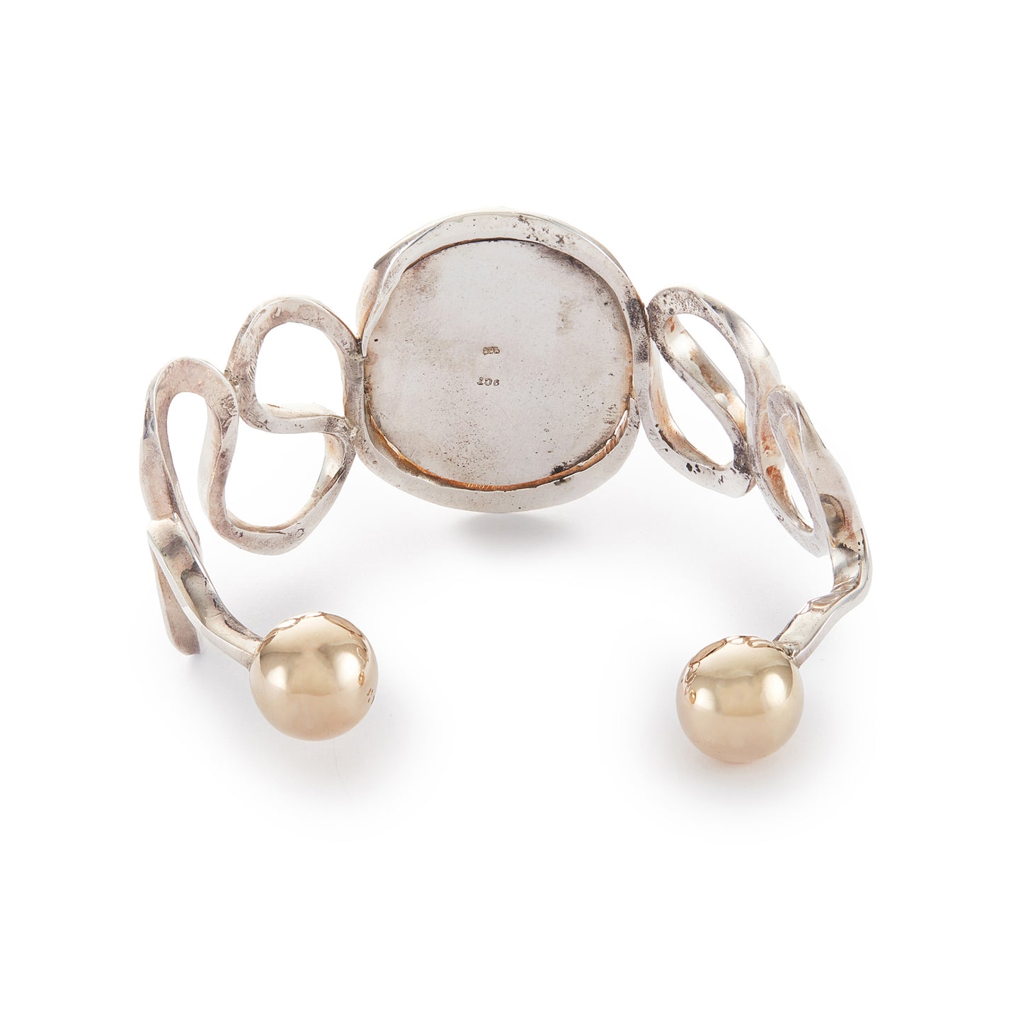 Beautifully handcrafted vintage designer sterling silver bangle with a classic cameo in a 9ct rose gold frame and 9ct rose gold beads at the opening. Will fit most wrists.