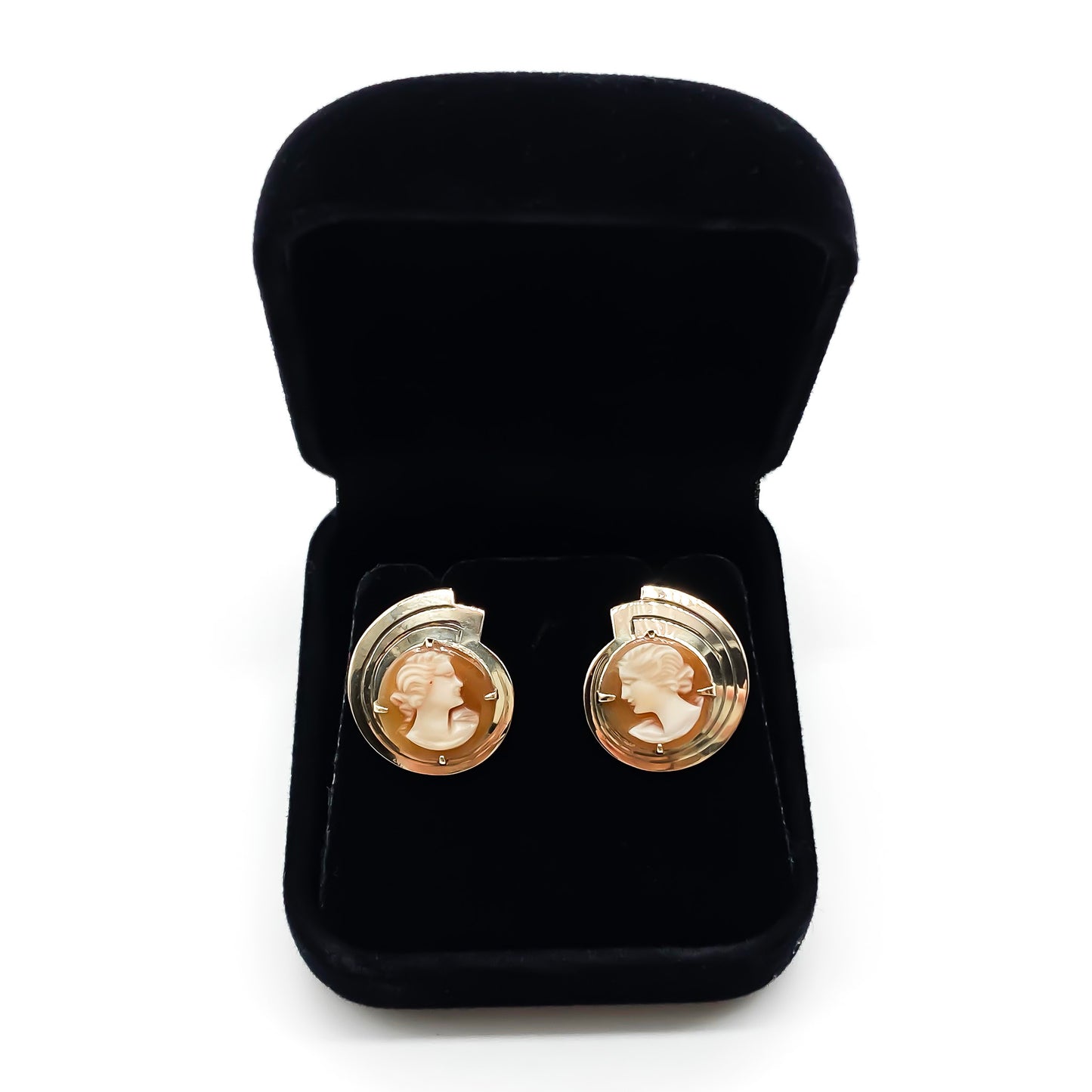 Stylish vintage 9ct rose gold stud earrings set with two beautifully carved cameos.