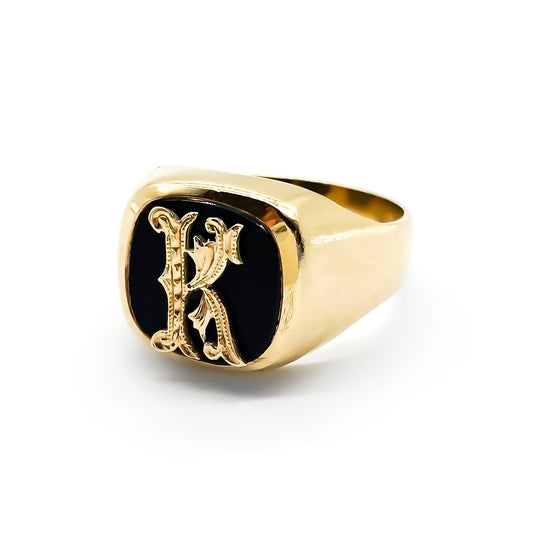 Charming vintage 9ct rose gold signet ring set with an onyx and fancy script letter “K”.