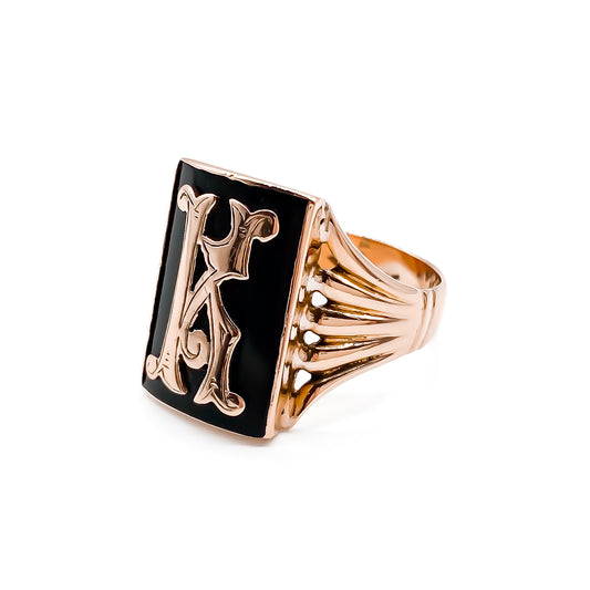 Charming 9ct rose gold signet ring with black enamelling and a fancy script letter “K”. 