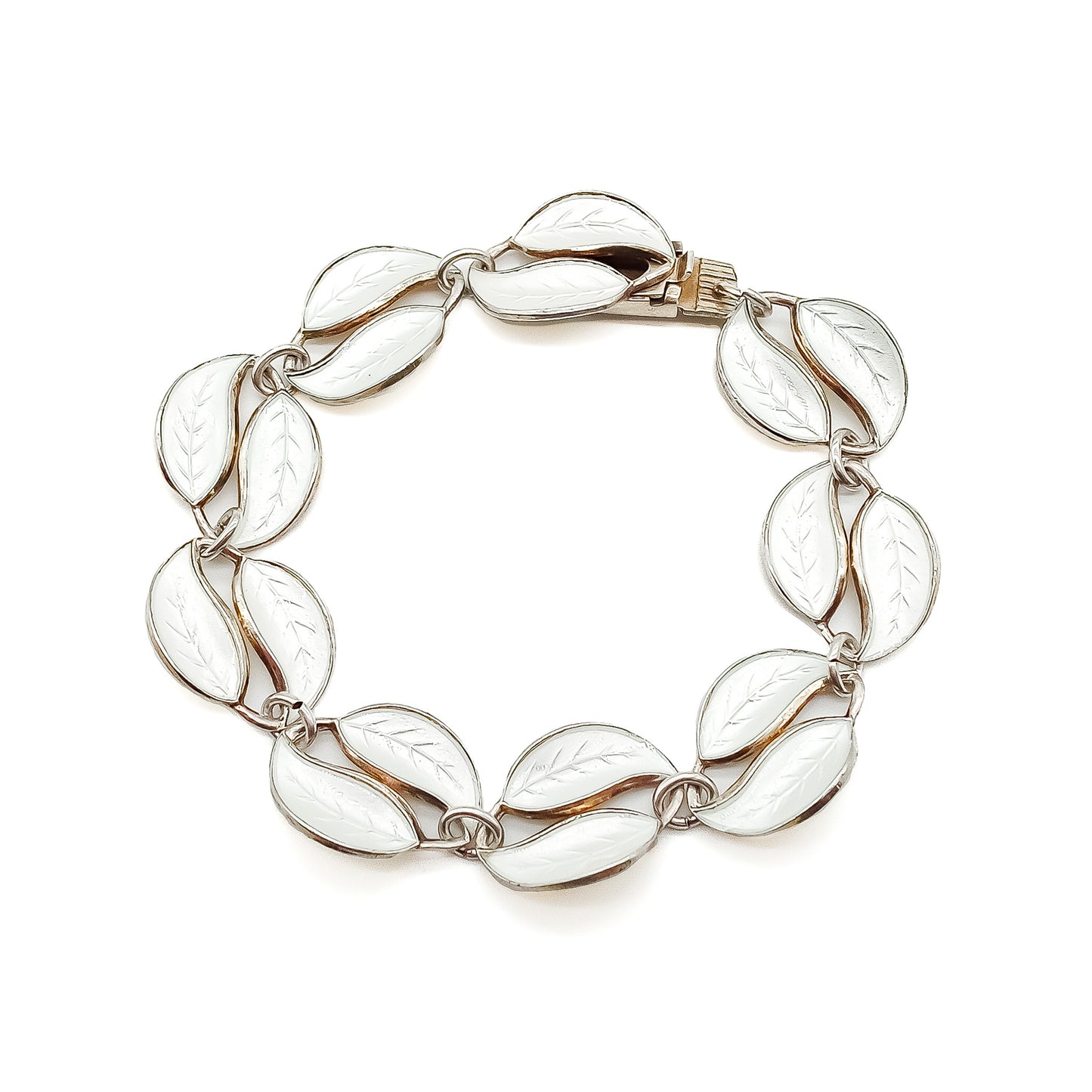 Stylish white enamelled silver gilt vintage leaf bracelet. Would work beautifully as a bridal accessory. Has a matching necklace. David Anderson. Norway.
